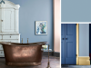Little Greene - Grey Stone 276 in de badkamer op de muur met een grote witte kast en koperkleurige badkuip